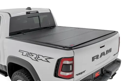 Rough Country - 49320550 | Rough Country Hard Tri-Fold Flip Up Tonneau Bed Cover For Ram 1500 (2019-2023) / 1500 TRX (2021-2023) | 5' 7" Bed Without RamBox Storage