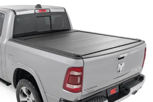 Rough Country - 56320551 | Rough Country Power Retractable Bed Cover Ram 1500 / 1500 TRX | 2019-2025 | 5' 7" Bed