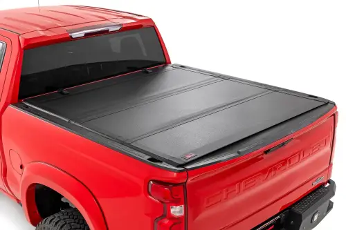 Rough Country - 49120580 | Rough Country Hard Tri-Fold Flip Up Tonneau Bed Cover For Chevrolet Silverado 1500 / GMC Sierra 1500 | 2019-2023 | 5' 10" Bed