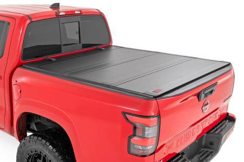 Rough Country - 49520551A | Rough Country Hard Tri-Fold Flip Up Bed Cover (2022-2024 Frontier 2WD/4WD | 5' Bed)