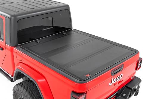 Rough Country - 49620500 | Rough Country Hard Tri-Fold Flip Up Bed Cover (2020-2024 Gladiator JT 4WD | 5' Bed)