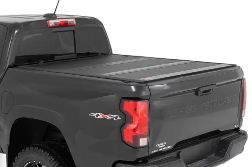 Rough Country - 47520551A | Rough Country Hard Low Profile Bed Cover For Nissan Frontier | 2022-2024 | With Cargo Management | 5' Bed