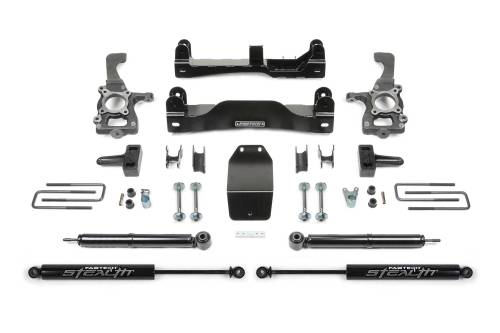 Fabtech Motorsports - FTSK2183M | Fabtech 4 Inch Basic System With Rear Stealth Shocks (2009-2013 F150 Pickup 4WD)