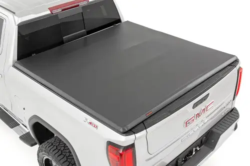 Rough Country - 41308550 | Rough-Country Soft Tri-Fold Bed Cover (2019-2025 Silverado, Sierra 1500 2WD/4WD 5'10" Bed | Short Bed)