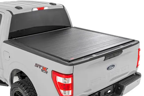 Rough Country - 50221550 | Rough Country Hard Roll Up Bed Cover For Ford F-150 (2015-2024) / F-150 Lightning (2022-2024) | 5'7" Bed