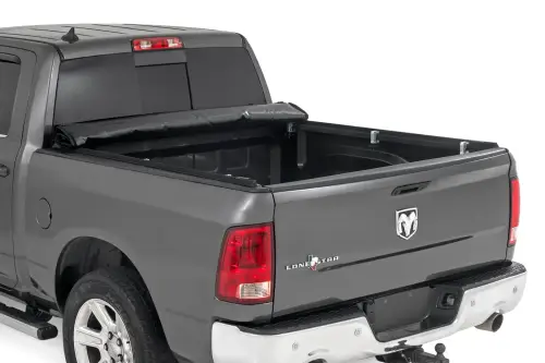 Rough Country - 42319640 | Rough Country Soft Roll Up Bed Cover (2009-2018 Ram 1500 2WD/4WD | 2010-2024 Ram 2500 Pickup 2WD/4WD | 6'4" Bed)