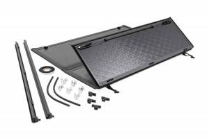 47414551 | Toyota Low Profile Hard Tri-Fold Tonneau Cover (02-22 Tundra | 5.5' Bed W/ Factory Cargo Management System)