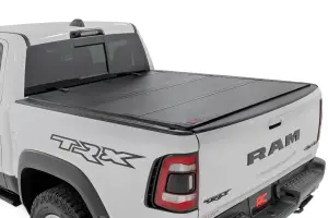 Rough Country - 49320550 | Rough Country Hard Tri-Fold Flip Up Tonneau Bed Cover For Ram 1500 (2019-2025) / 1500 TRX (2021-2025) | 5' 7" Bed Without RamBox Storage - Image 1