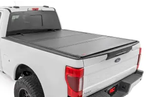 Rough Country - 49220651 | Rough Country Hard Tri-Fold Flip Up Tonneau Bed Cover For Ford F-250/F-350 Super Duty | 2017-2023 | 6'10" Bed - Image 1