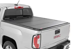 49120600 | Rough Country Hard Tri-Fold Flip Up Tonneau Bed Cover For Chevrolet Colorado / GMC Canyon | 2015-2023 | 6' Bed