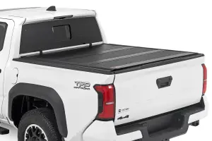 47415551B | Rough Country Hard Low Profile Bed Cover For Toyota Tacoma 2/4WD (2024-2024) | 5' Bed