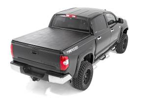 41714551 | Rough Country Soft Tri-Fold Bed Cover | 5'7" Bed | Toyota Tundra 2WD/4WD (2007-2025)