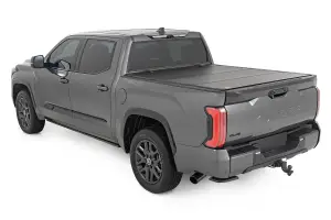 49514551 | Rough Country Hard Tri-Fold Flip Up Bed Cover (2022-2025 Tundra 2WD/4WD | 5'7" Bed)